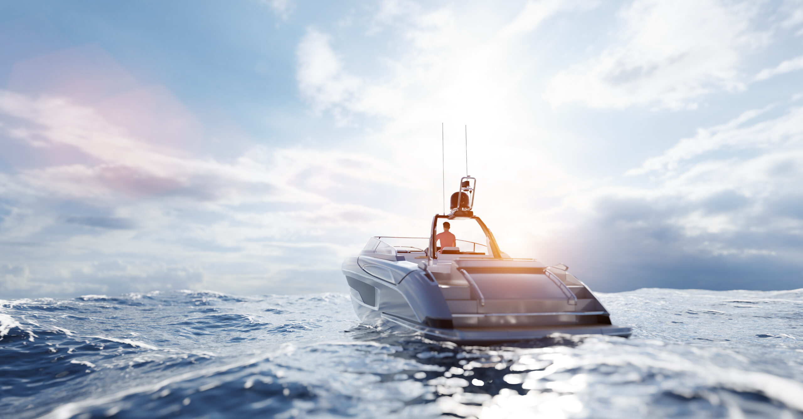 Catamaran motor yacht on the ocean at sunset